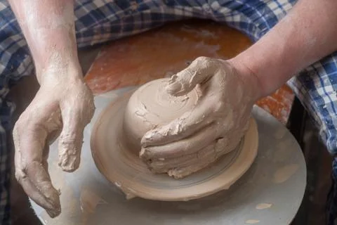 Hands of a potter Stock Photos