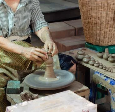 Hands of a potter Stock Photos