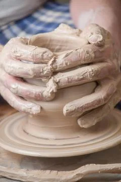 Hands of a potter Stock Photos