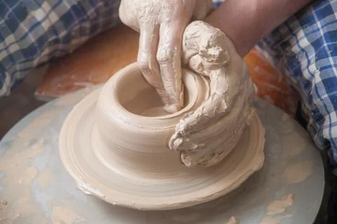 Hands of a potter Stock Photos