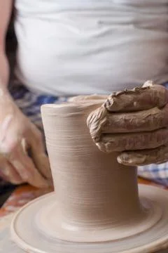 Hands of a potter Stock Photos