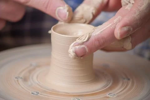 Hands of a potter Stock Photos