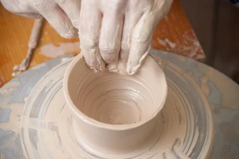 Hands of a potter Stock Photos