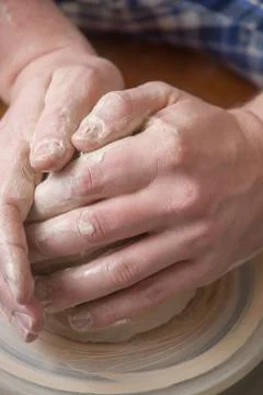 Hands of a potter Stock Photos