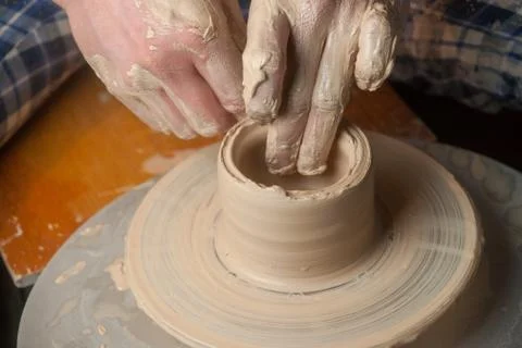 Hands of a potter Stock Photos