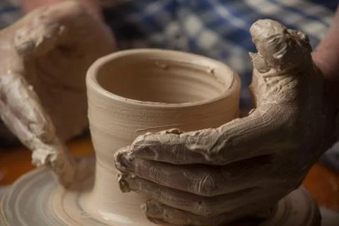 Hands of a potter Stock Photos