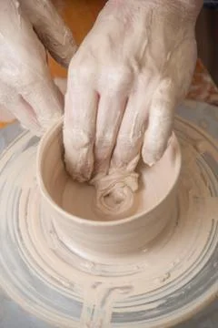 Hands of a potter Stock Photos