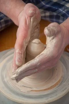Hands of a potter Stock Photos