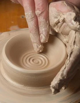 Hands of a potter Stock Photos