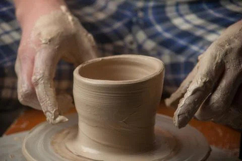 Hands of a potter Stock Photos