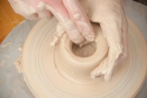 Hands of a potter Stock Photos