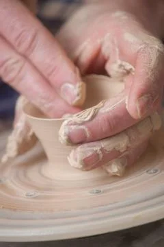 Hands of a potter Stock Photos
