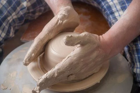 Hands of a potter Stock Photos
