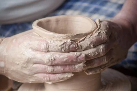 Hands of a potter Stock Photos