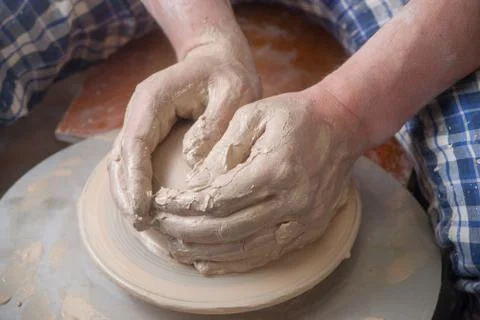 Hands of a potter Stock Photos