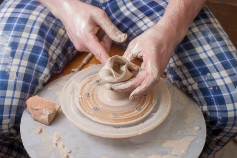 Hands of a potter Stock Photos