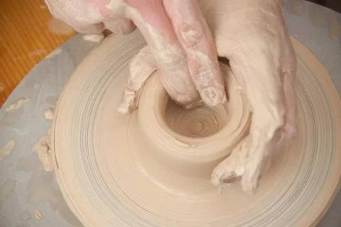 Hands of a potter Stock Photos