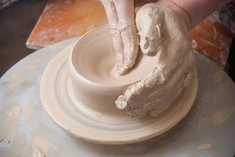 Hands of a potter Stock Photos