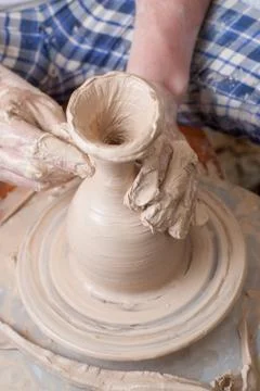 Hands of a potter Stock Photos