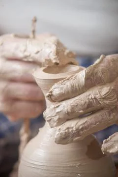 Hands of a potter Stock Photos