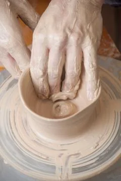 Hands of a potter Stock Photos