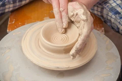 Hands of a potter Stock Photos