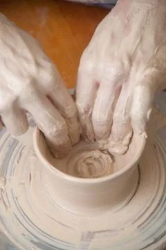 Hands of a potter Stock Photos