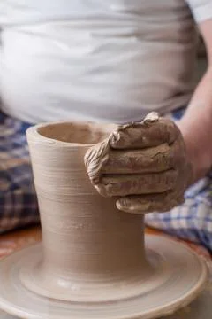 Hands of a potter Stock Photos