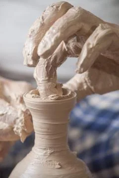 Hands of a potter Stock Photos