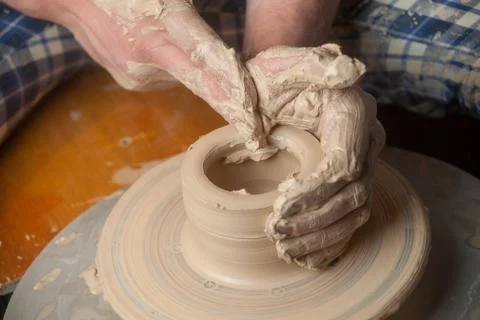 Hands of a potter Stock Photos