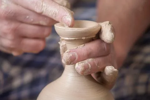 Hands of a potter Stock Photos