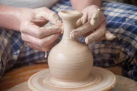 Hands of a potter Stock Photos