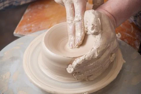 Hands of a potter Stock Photos