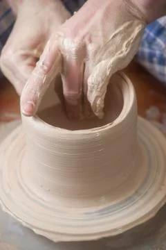 Hands of a potter Stock Photos