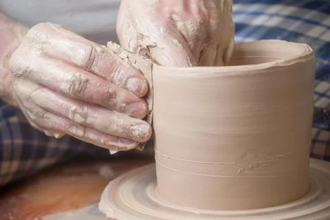 Hands of a potter Stock Photos