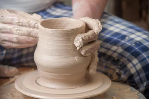 Hands of a potter Stock Photos