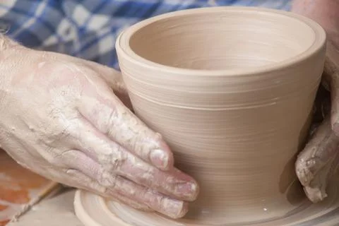 Hands of a potter Stock Photos