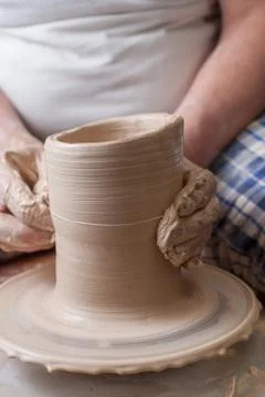 Hands of a potter Stock Photos