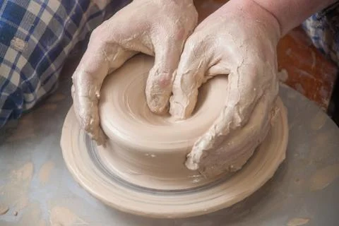 Hands of a potter Stock Photos