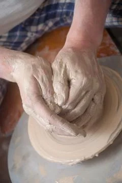 Hands of a potter Stock Photos