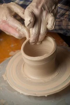 Hands of a potter Stock Photos