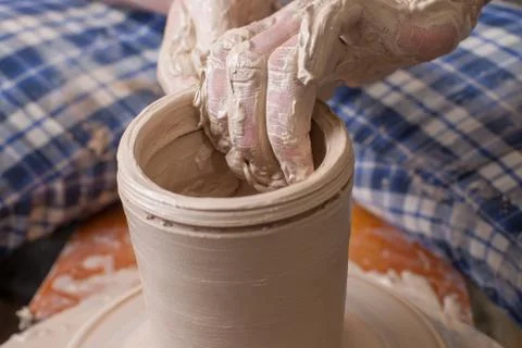Hands of a potter Stock Photos