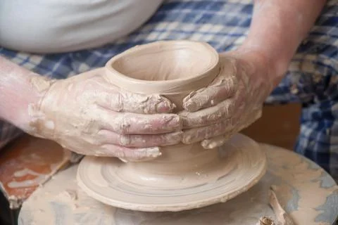 Hands of a potter Stock Photos