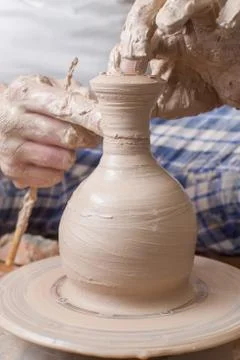 Hands of a potter Stock Photos