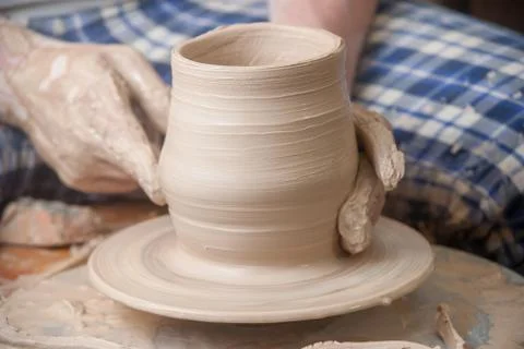 Hands of a potter Stock Photos