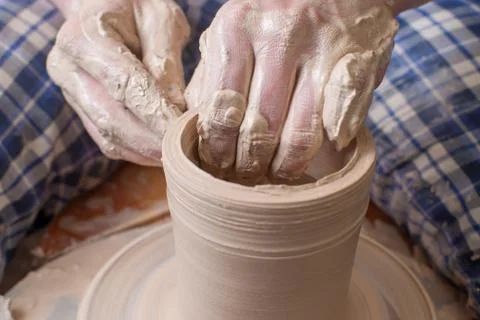 Hands of a potter Stock Photos
