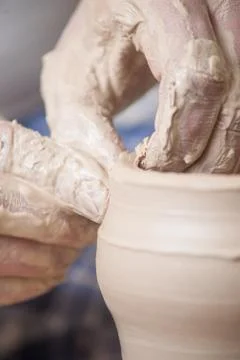 Hands of a potter Stock Photos