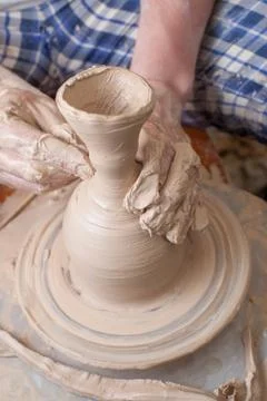 Hands of a potter Stock Photos