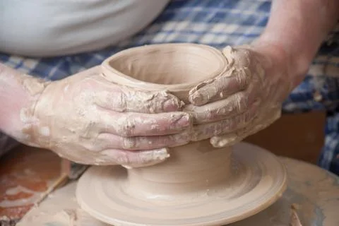 Hands of a potter Stock Photos