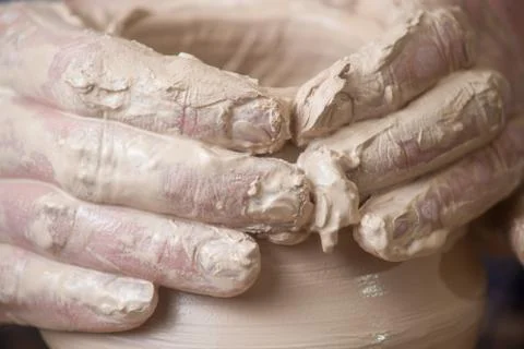 Hands of a potter Stock Photos